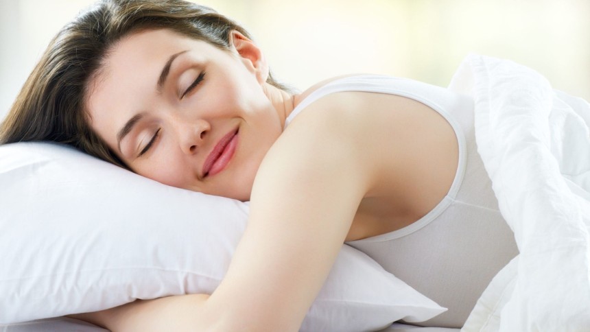 A woman enjoying her comfortable sleep in a comfortable sleeping environment