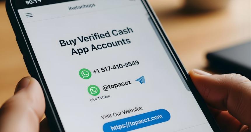 Cash App debit card placed on a desk next to smartphone