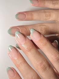 sage green french tip nails